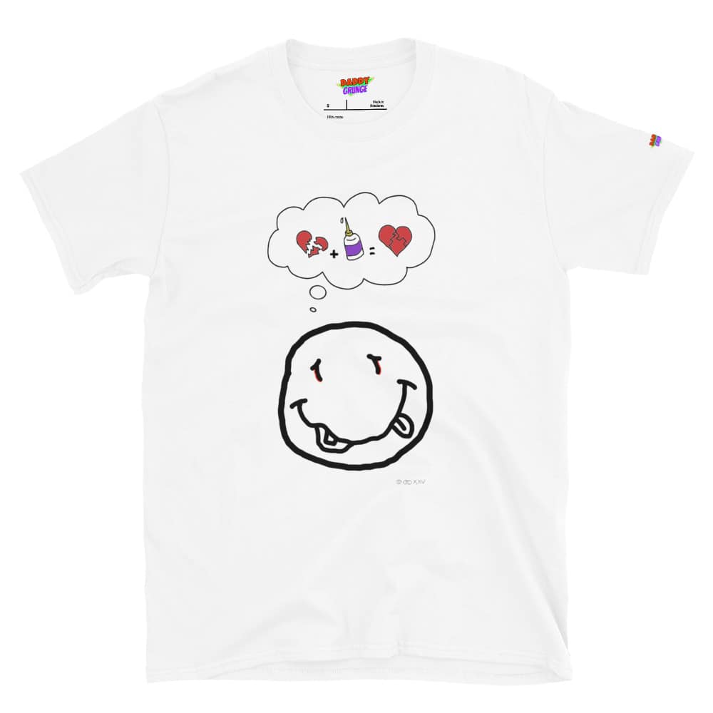 Picture with a white colored shirt with a cartoonish yellow smiley resembling the Nirvana smiley who has a a thought bubble showing a broken heart with a glue squeeze bottle which connects the broken pieces to a repaired heart with the pieces glued together