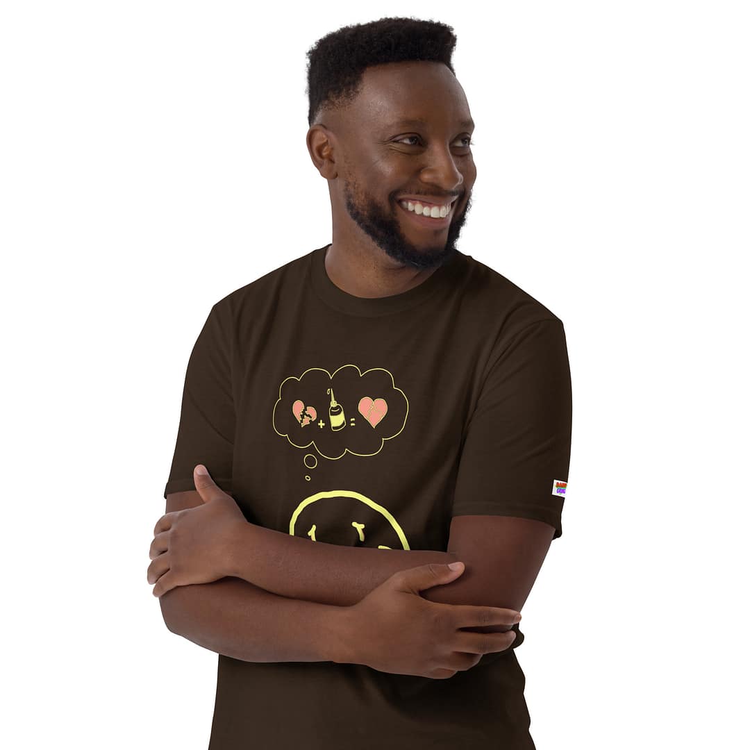 Black guy in a dark brown daddy grunge cartoon shirt with the altered Nirvana smiley and the thought bubble with the glued together heart pieces as a motive.