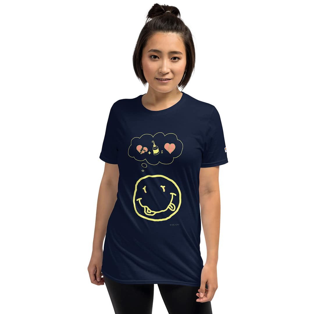 Asian girl in a dark navy blue colored daddy grunge cartoon shirt with the altered Nirvana smiley and the thought bubble with the glued together heart pieces as a motive.