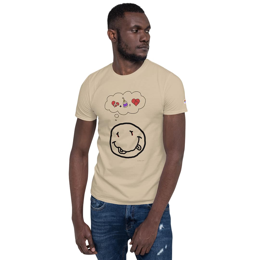 Black male model in a sand-colored daddy grunge cartoon shirt with the altered Nirvana smiley and the thought bubble with the glued together heart pieces as a motive.