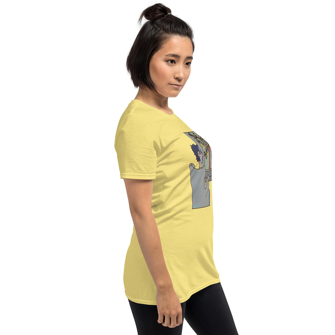 Asian girl looking to the left and slightly turned to the side wearing a bright yellow emo T-shirt of Daddy grunge showing a cartoon of a moody guy sitting in a chair and looking out into the gloomy, rainy weather where outside a tree with lemons stands.